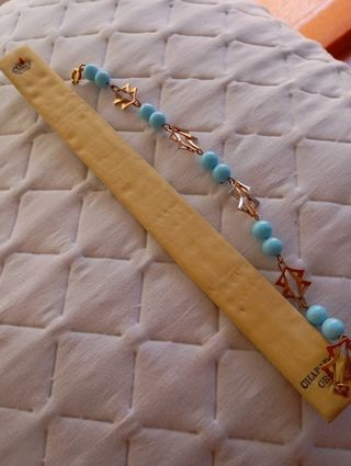 Pulsera chapada en oro con estrellas y perlas