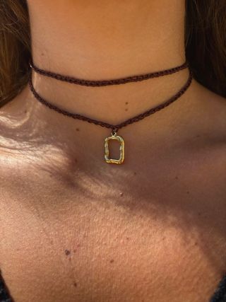Collana Choker uncinetto con ciondolo oro