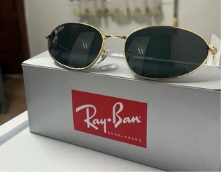 Gafas de sol Ray-Ban doradas y verdes