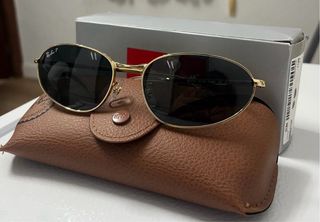 Gafas de sol Ray-Ban doradas y verdes