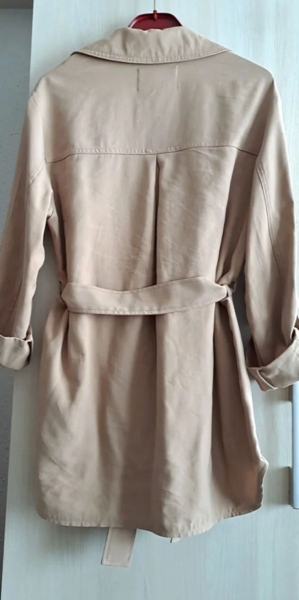 Trench coat regolabile