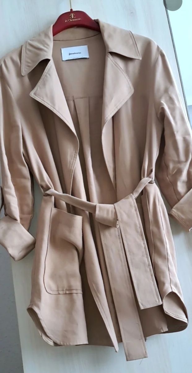 Trench coat regolabile