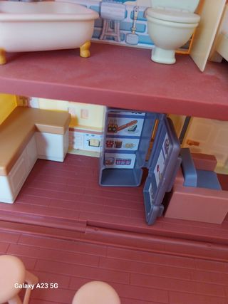 Casa y Coche Bluey y muñecos de la familia
