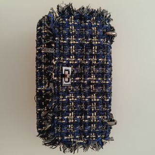 Bolso de tweed con cadena