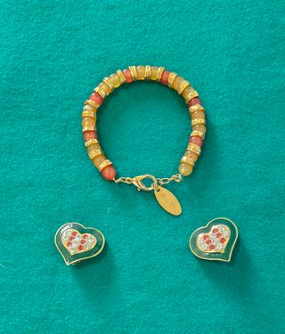 Conjunto de pulsera y pendientes corazón