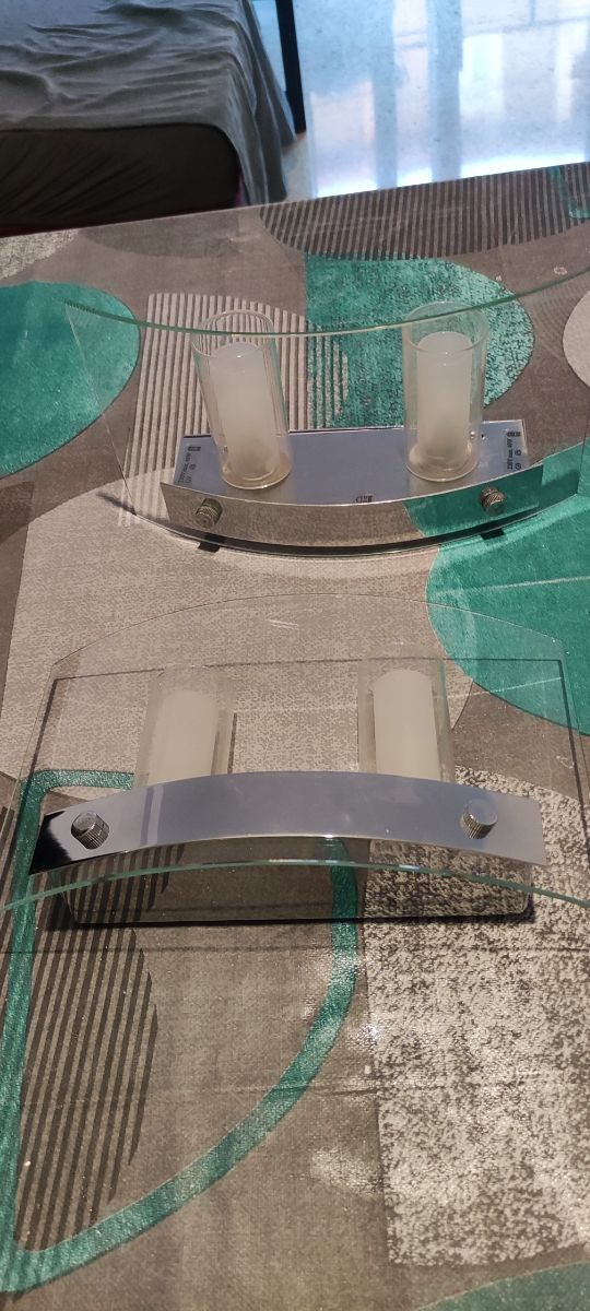 2 Lámparas de pared plateadas y transparentes