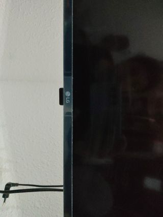 Televisor LG 43+base para poner en pared universal