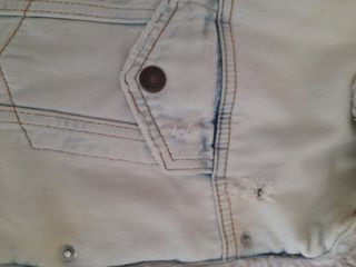 Giacca di jeans bianca effetto strappato