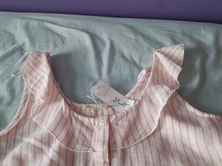 Blusa de rayas rosa