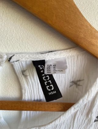 Blusa H&M blanca con estampado de pájaros