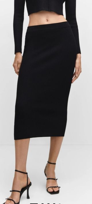Falda midi punto canalé negra