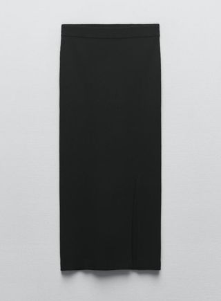 Falda midi punto canalé negra