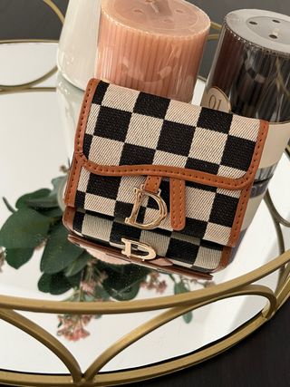 Cartera Dior dorada