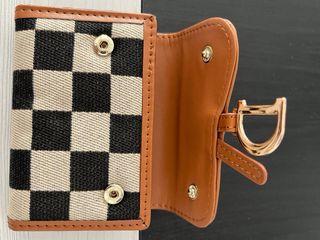 Cartera Dior dorada
