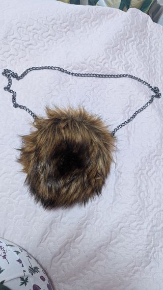 Bolso pelo marrón y negro