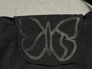 Bolso negro con mariposa