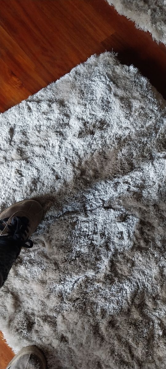 2 Alfombras Beige lado cama