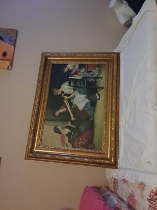 Quadro con cornice dorata
