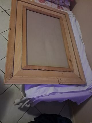 Quadro con cornice dorata
