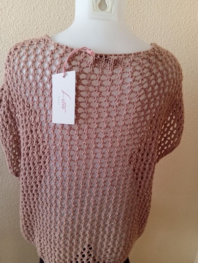 Suéter de punto calado rosa