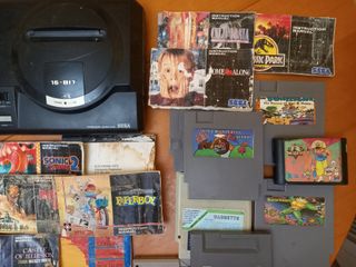 Megadrive Sega + juegos y manuales