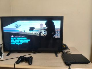 PS2 Slim Sony Negra + Caja + 2 Mandos + GTA