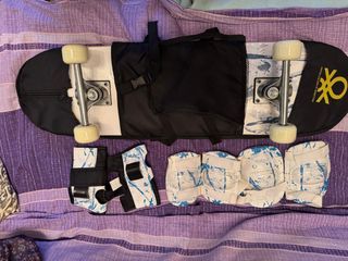 Skateboard Benetton con accessori protettivi