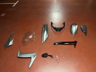 Conjunto lateral izquierdo Kymco Superdink 125 ABS