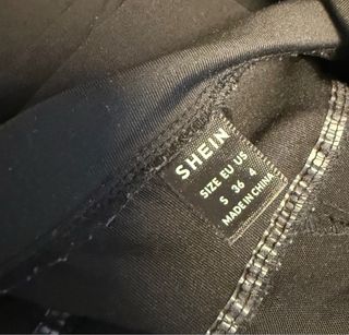 Pantalón premamá negro acampanado