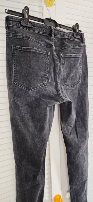 Pantalón negro vaquero chica