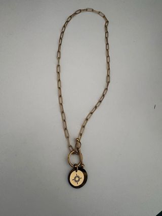 Collar de protección con ojo de tigre y sol
