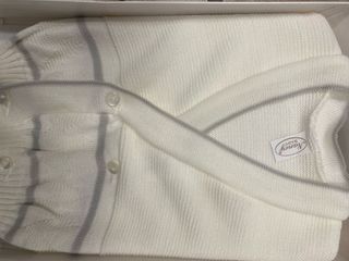 Scalda cuore neonata/o in lanetta