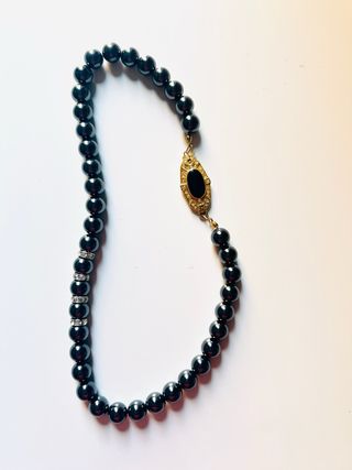 Set collane perle bianche e nere