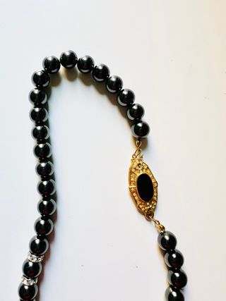 Set collane perle bianche e nere