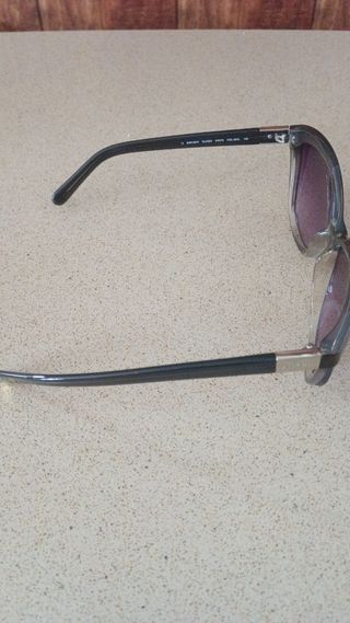 Gafas de sol unisex negras  y moradas