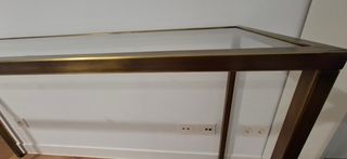 Consola de hierro y cristal dorada