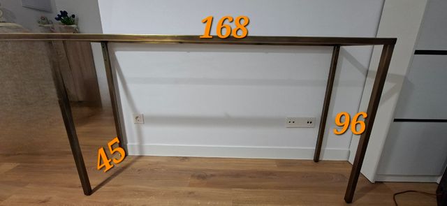 Consola de hierro y cristal dorada