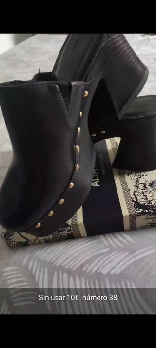 Zancos negros talla 38