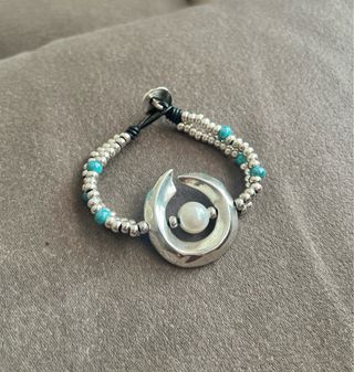 Pulsera media luna estilo Uno de 50