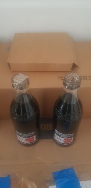 Coca-Cola Bottiglie 50° anniversario