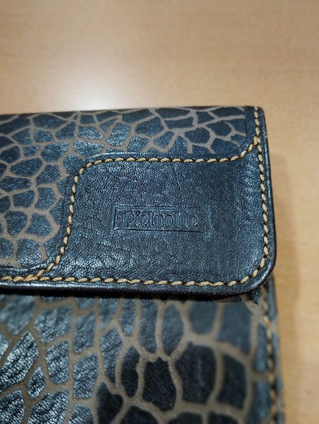 Monedero piel estampado animal