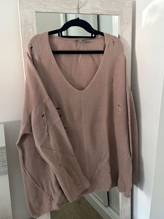 Jersey oversize rosa palo con rotos