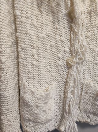 Chaqueta de punto con flecos