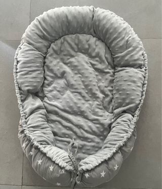 Reductor de cuna gris