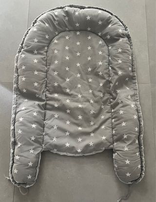 Reductor de cuna gris