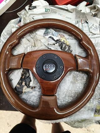 Volante de madera Audi
Piña desplazada
Pomo
