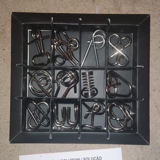 Juego de 12 rompecabezas de metal