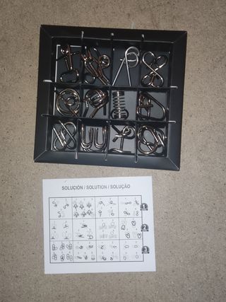 Juego de 12 rompecabezas de metal