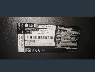 TV LG 49 con soporte para pared "precio negociable