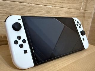 Nintendo Switch OLED + juegos 